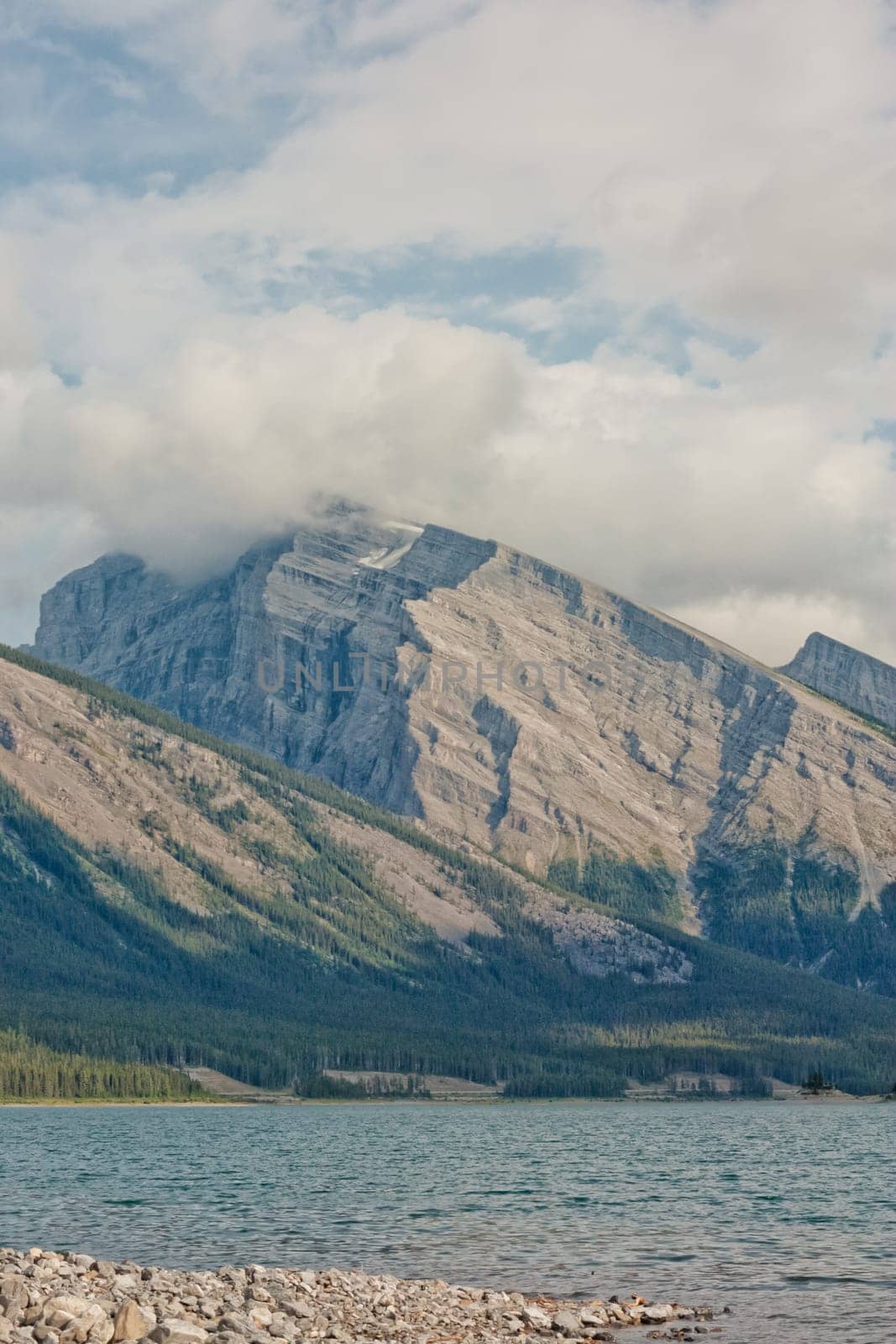 Portrait Landscape of Spray Lake with mountain in the background, Kananaskis, Alberta.