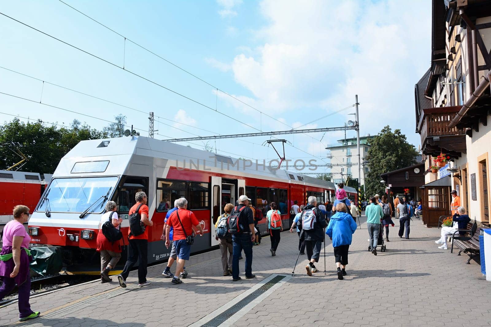 STARY SMOKOVEC, SLOVAKIA - SEPTEMBER 14, 2016: Rush hour at railway station Stary Smokovec in High Tatras. People travelling to Stary Smokovec to begin hiking in High Tatras.