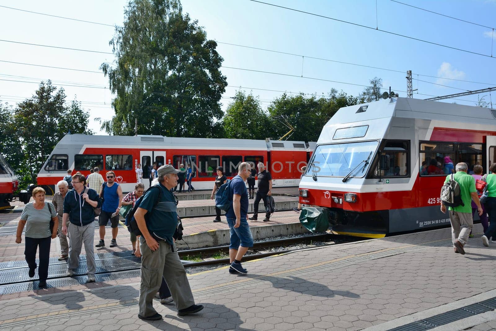 STARY SMOKOVEC, SLOVAKIA - SEPTEMBER 14, 2016: Rush hour at railway station Stary Smokovec in High Tatras. People travelling to Stary Smokovec to begin hiking in High Tatras.