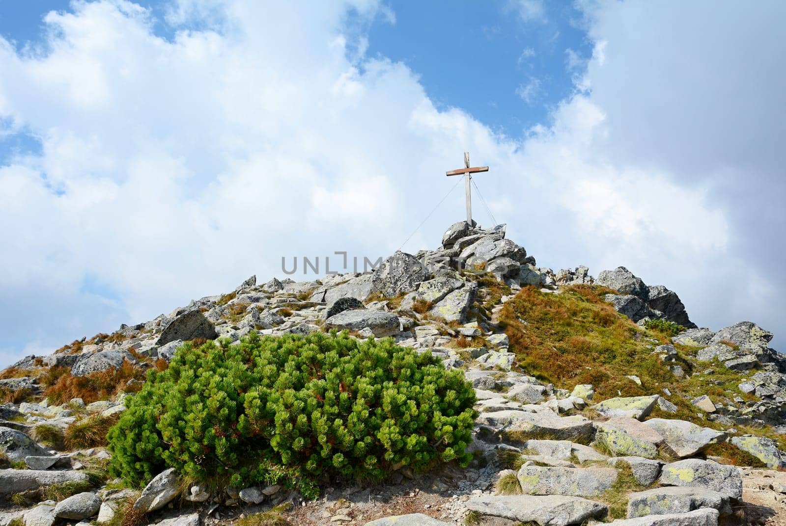 ..Wooden cross on top of the Predne Solisko peak in High Tatras mountain.