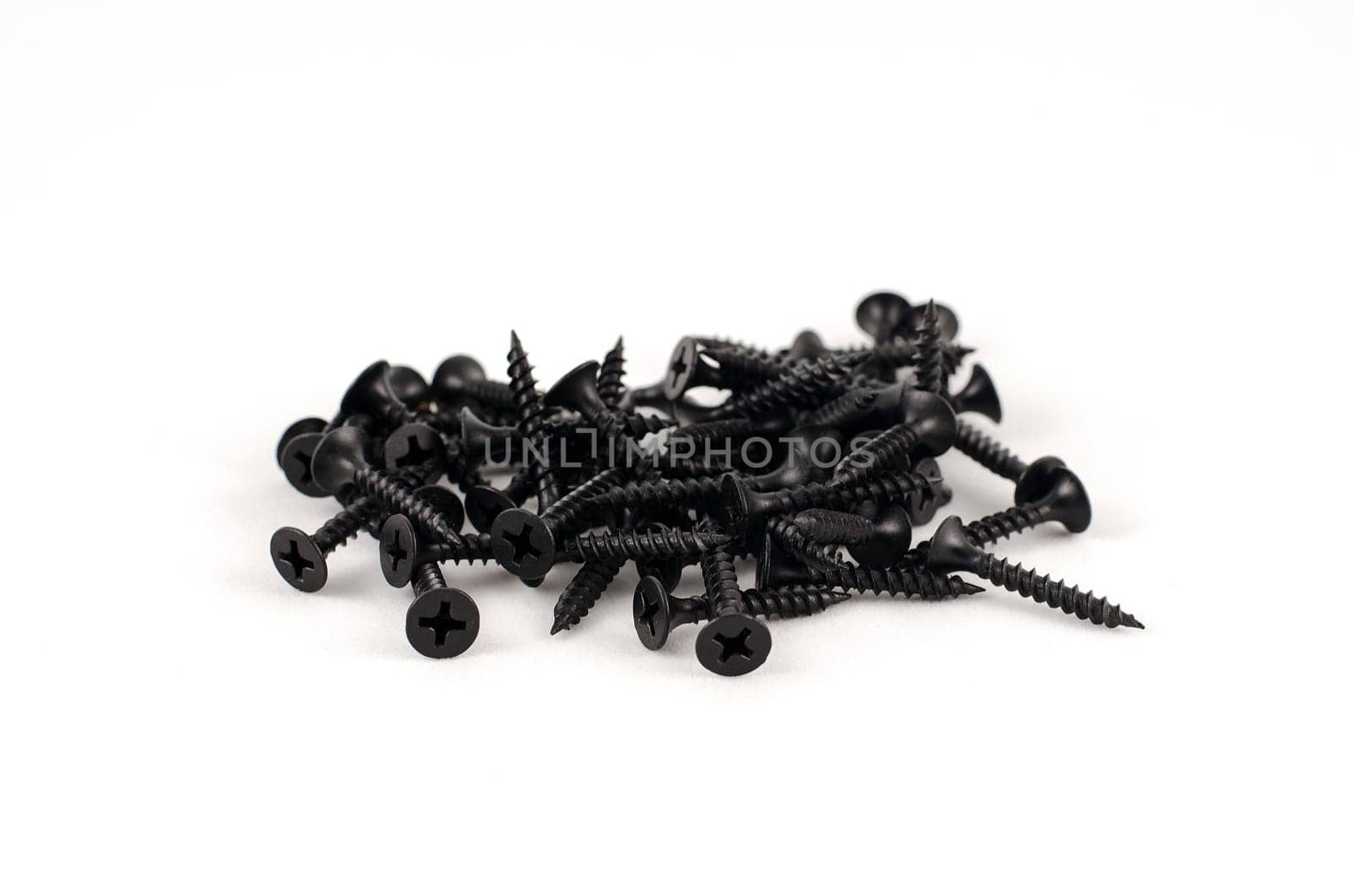 Black screws frame. Close-up. Macro.