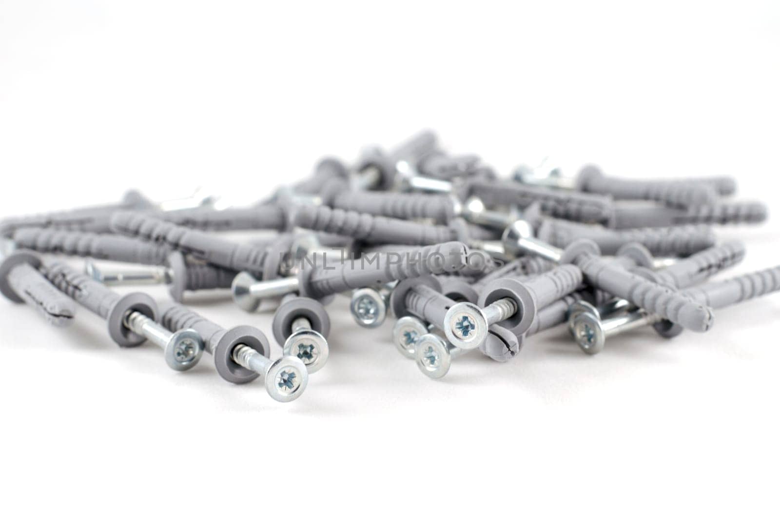 Metallic screws isolated over white background