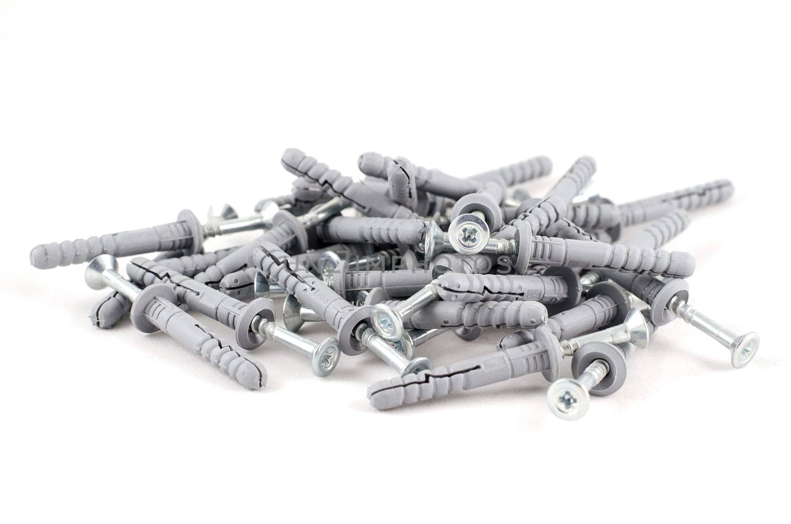 Metallic screws isolated over white background