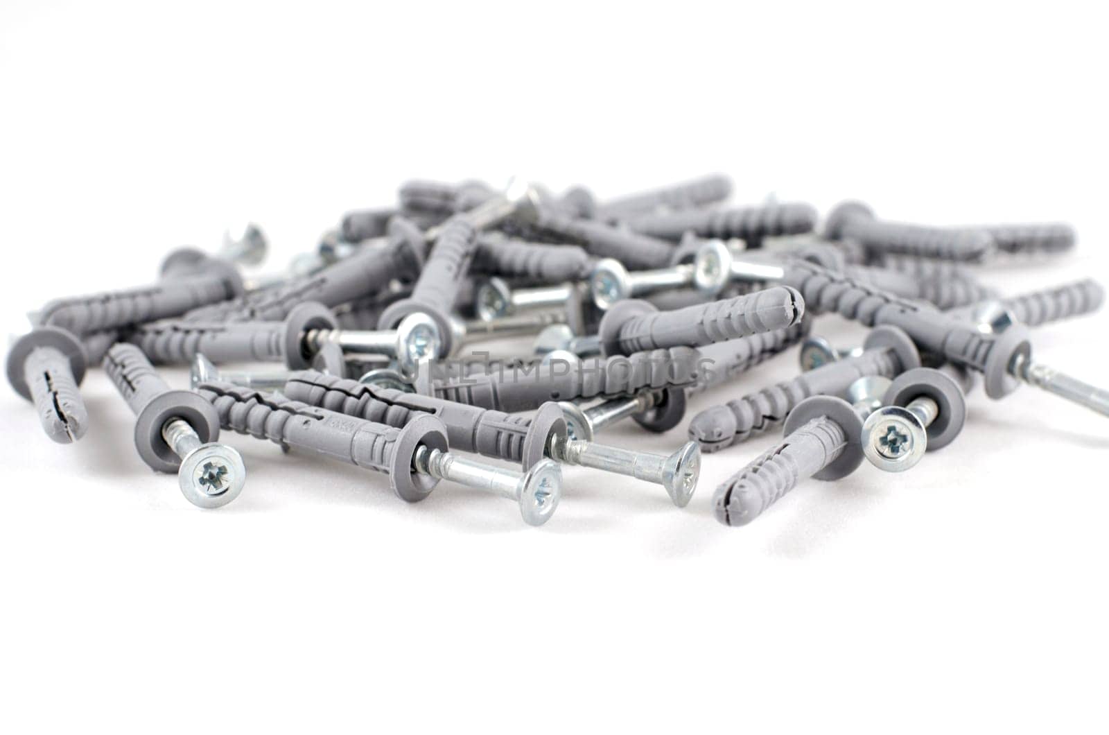 Metallic screws isolated over white background