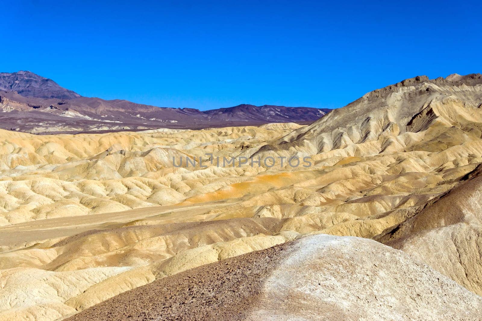 Landscape view of Death Valley National Park with a beautiful blue sky