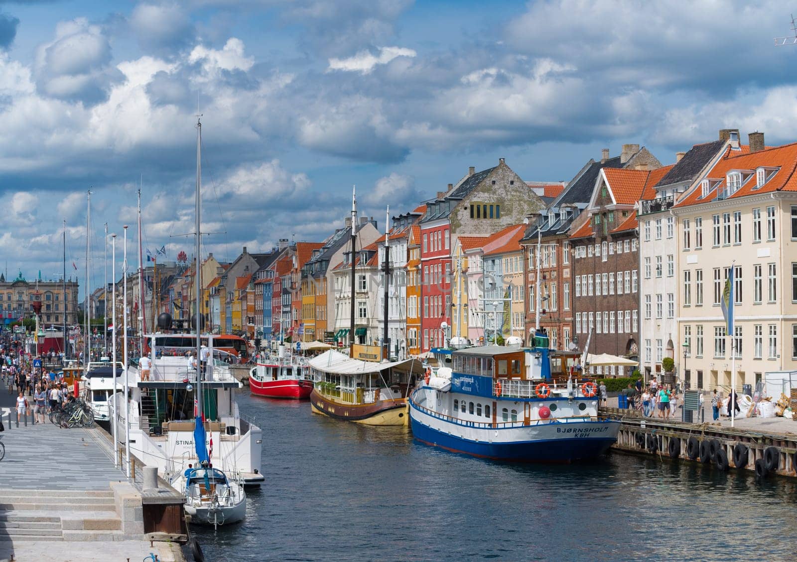 COPENHAGEN, DENMARK - JULY 31, 2016: Summer view of the famous Nyhavn with its colorful buildings