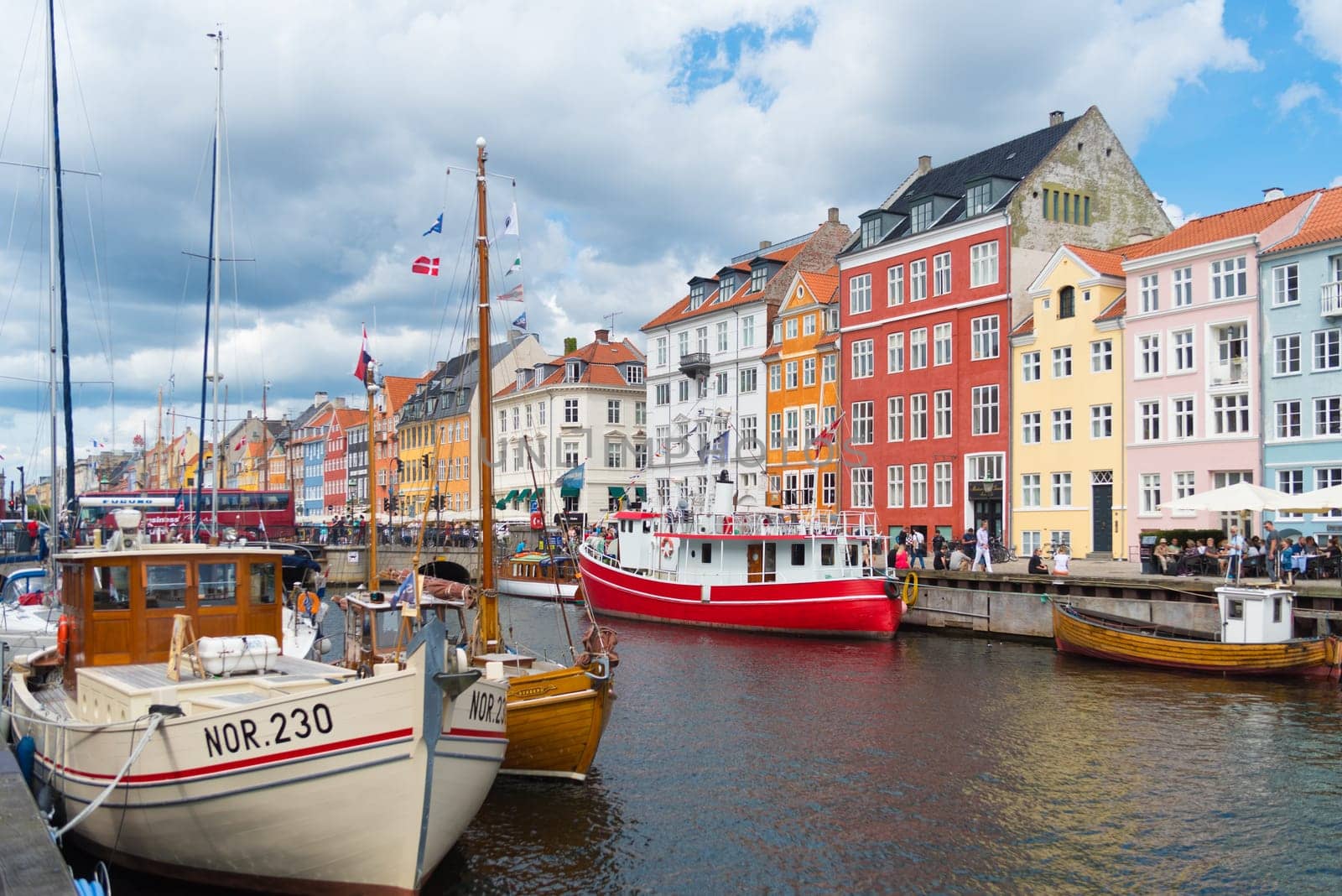COPENHAGEN, DENMARK - JULY 31, 2016: Summer view of the famous Nyhavn with its colorful buildings