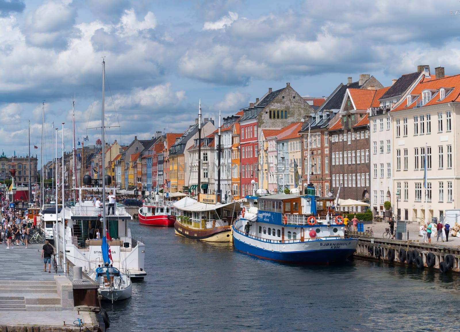 COPENHAGEN, DENMARK - JULY 31, 2016: Summer view of the famous Nyhavn with its colorful buildings