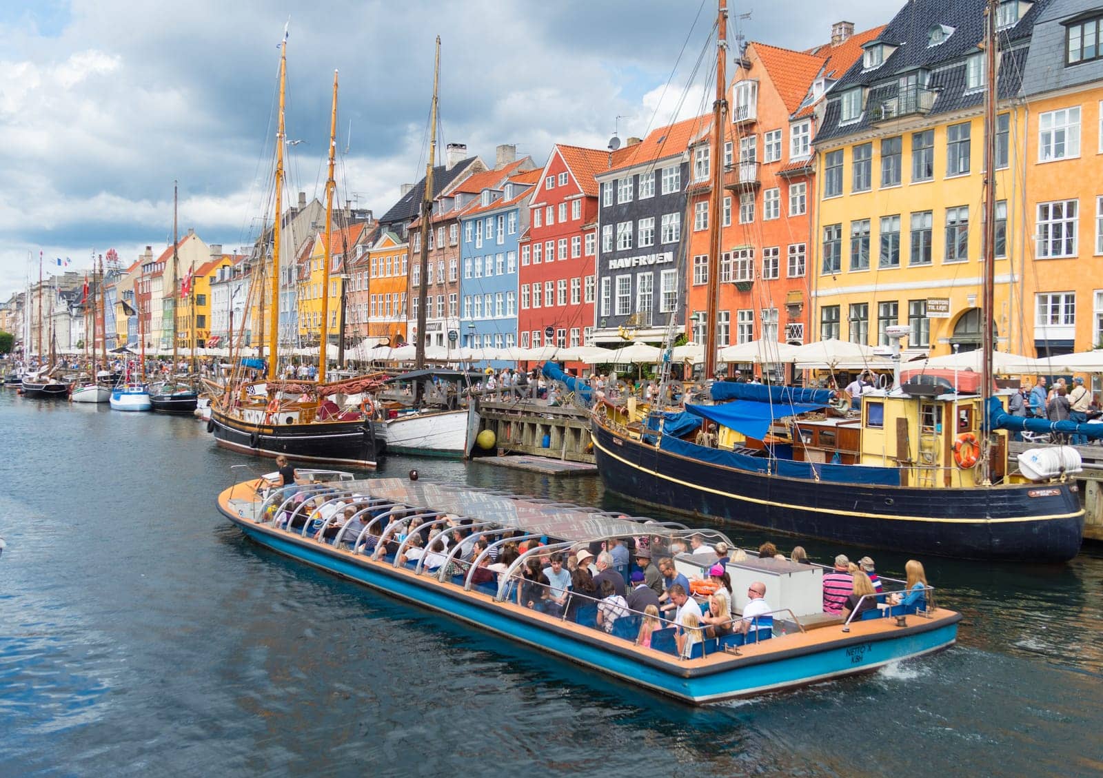 COPENHAGEN, DENMARK - JULY 31, 2016: Summer view of the famous Nyhavn with its colorful buildings