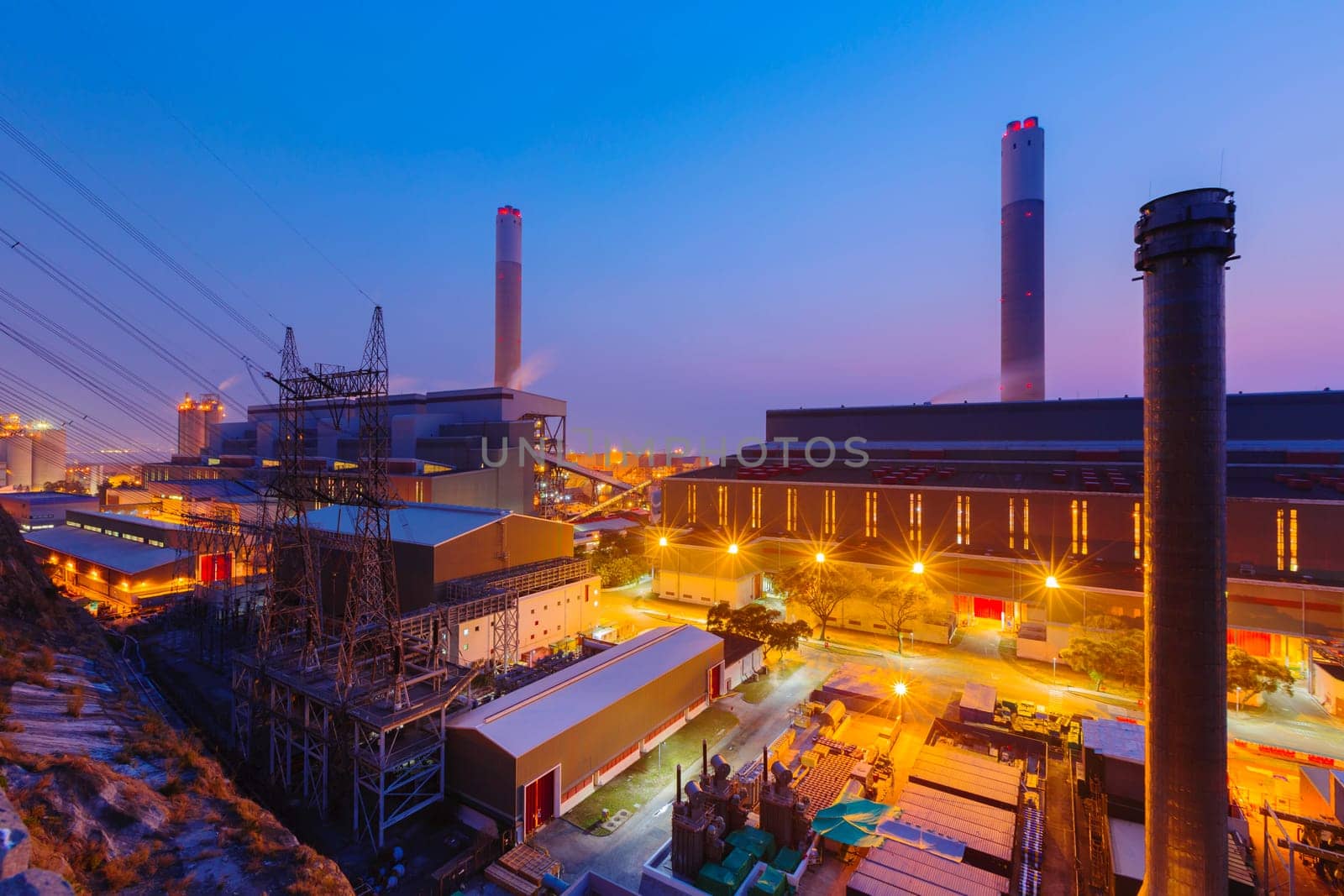 Hong Kong power station at sunset , Glow light of petrochemical industry