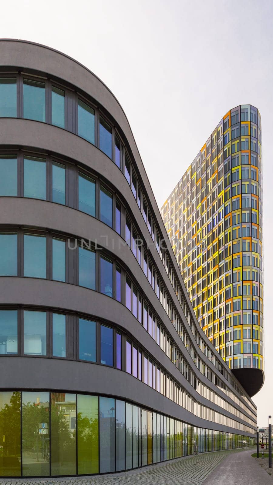 Munich, Germany - May 12, 2015: Exterior of unusual office building with smooth flowing. Headquarters of German automobile club ADAC.