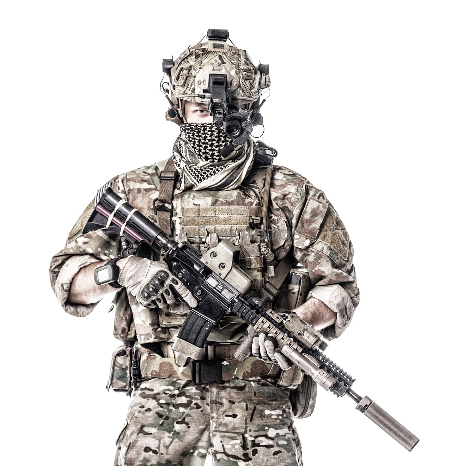 Army Ranger in field Uniforms with weapon, plate carrier and combat helmet are on, his face closed by Shemagh Kufiya scarf. Studio shot