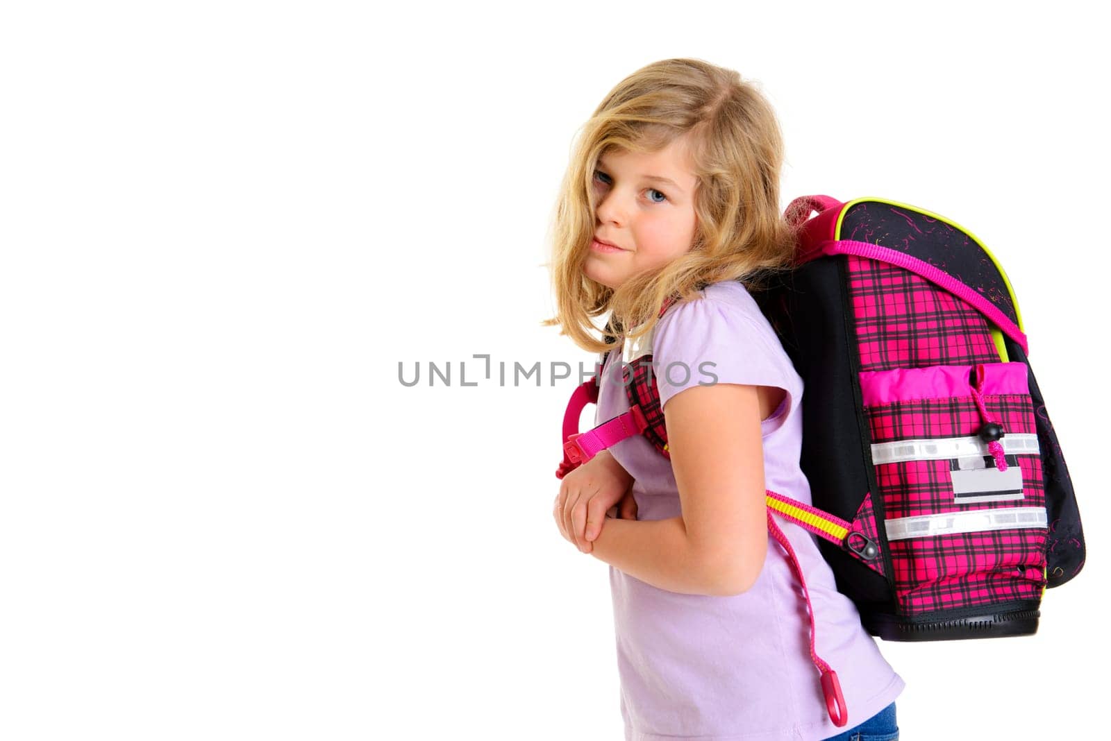 blond girl with schoolbag in front of white background