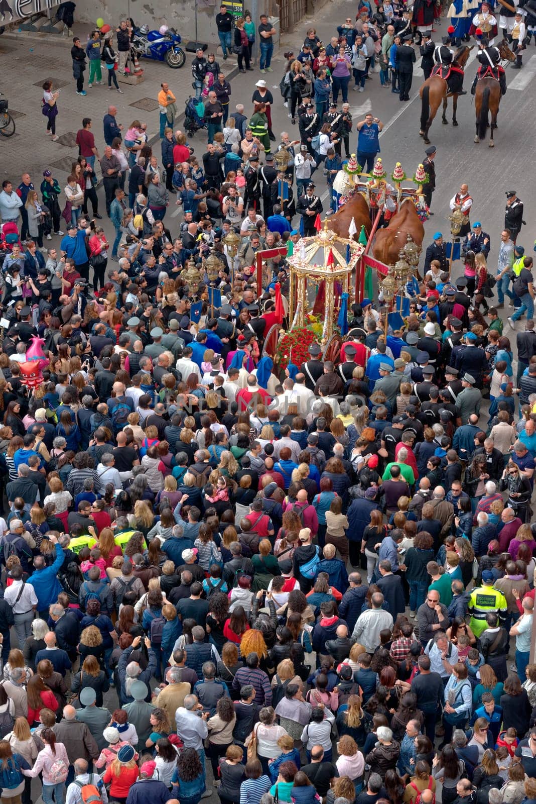 Cagliari, Italy - May 1, 2017: religious procession of Sat'Efisio - Sardinia - Parade of sardinian traditional costumes. Pilgrims from above.