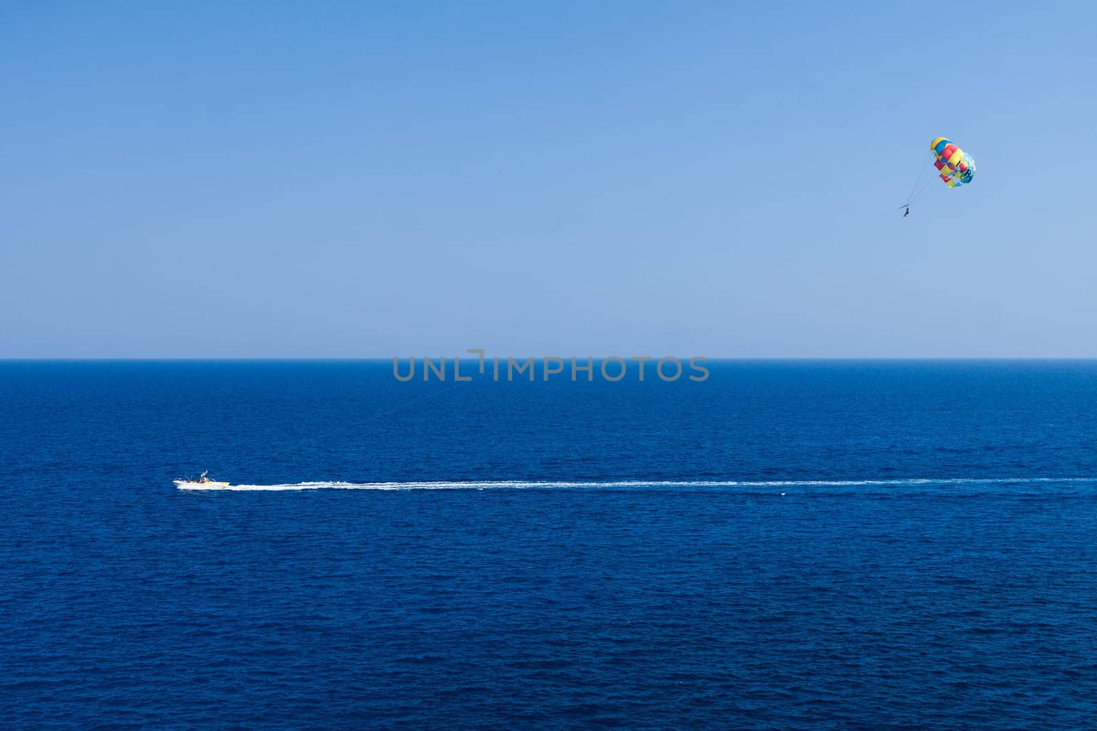Parasailing is a popular pastime in many resorts around the world. The active form of relaxation.
