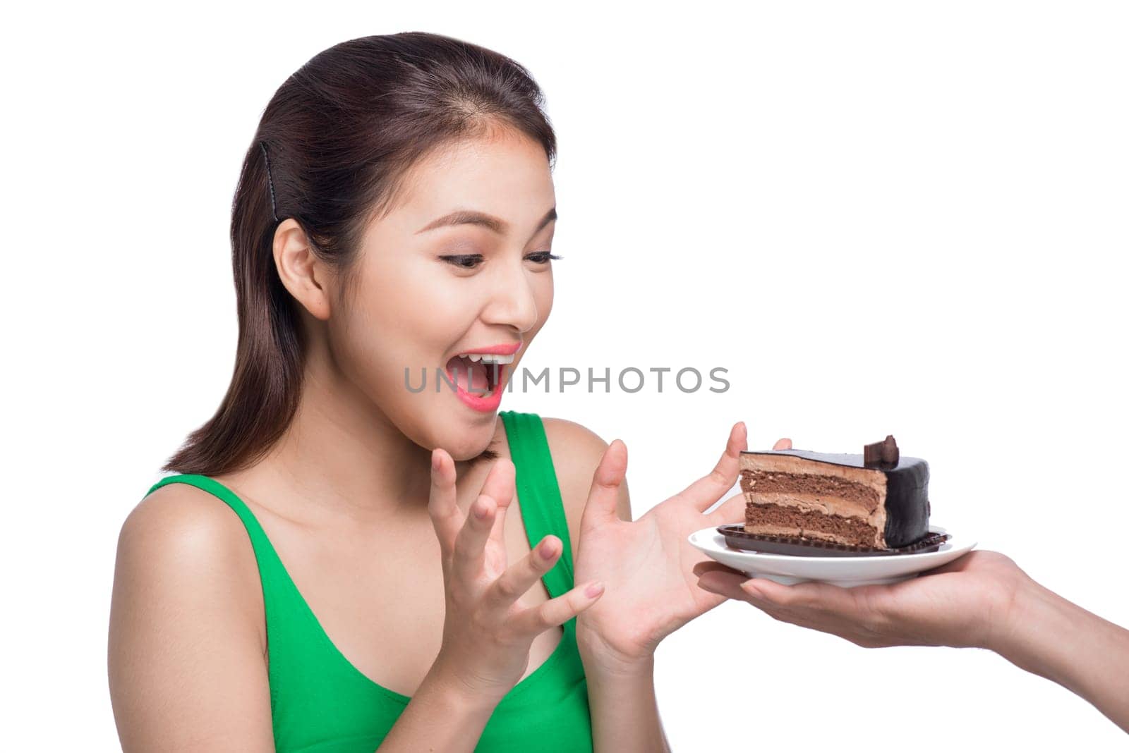 Beautiful smiling asian young woman with a chocolate cake isolated on white background.