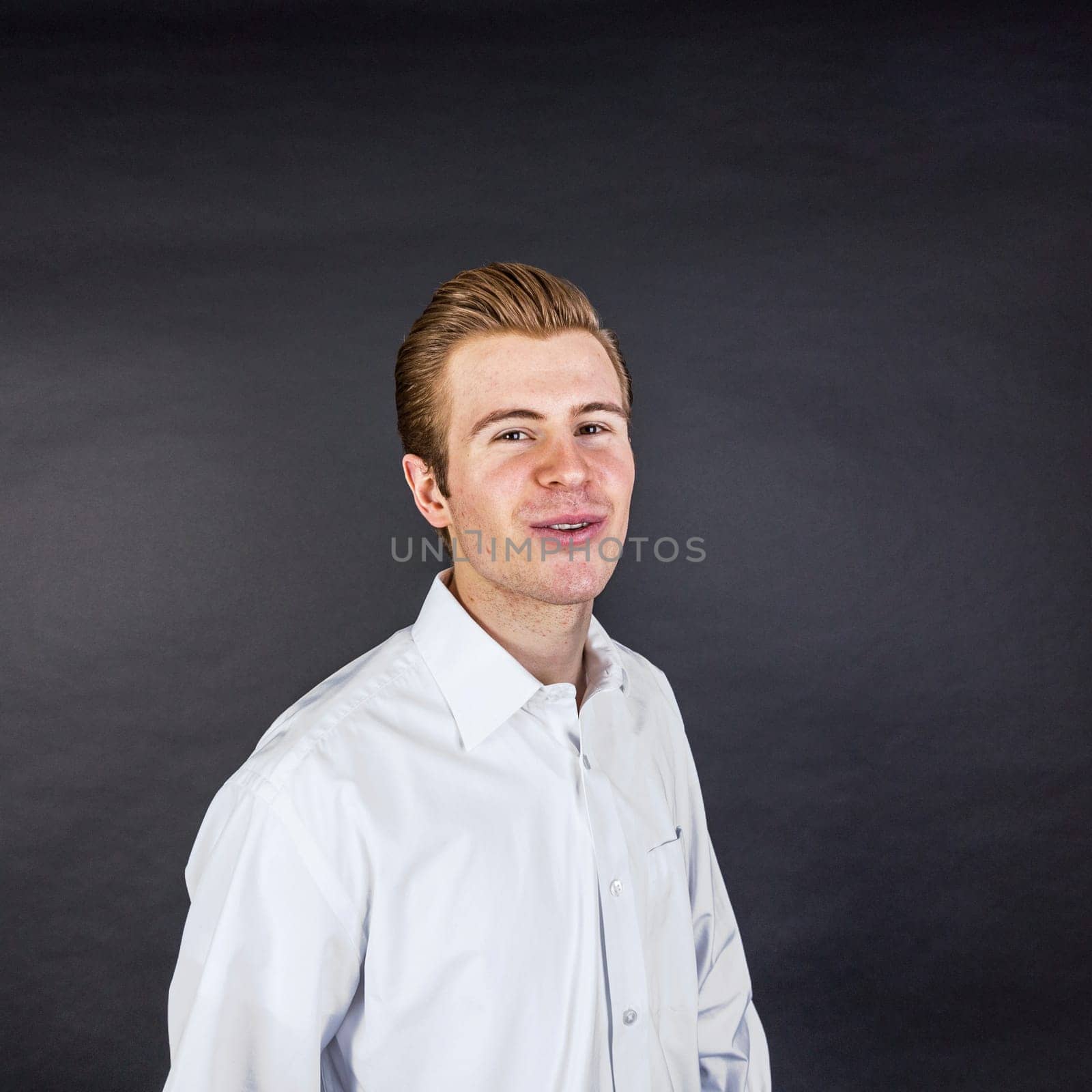 portrait of cool looking teenage boy in studio