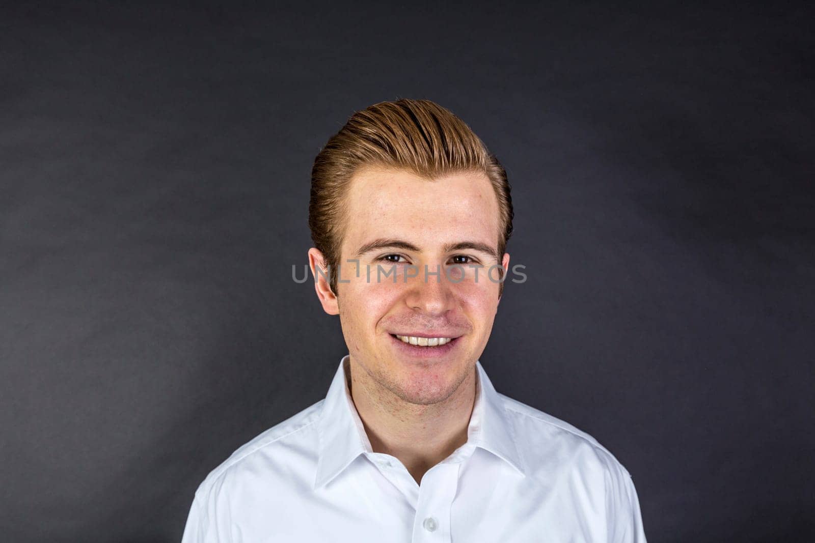 portrait of cool looking teenage boy in studio