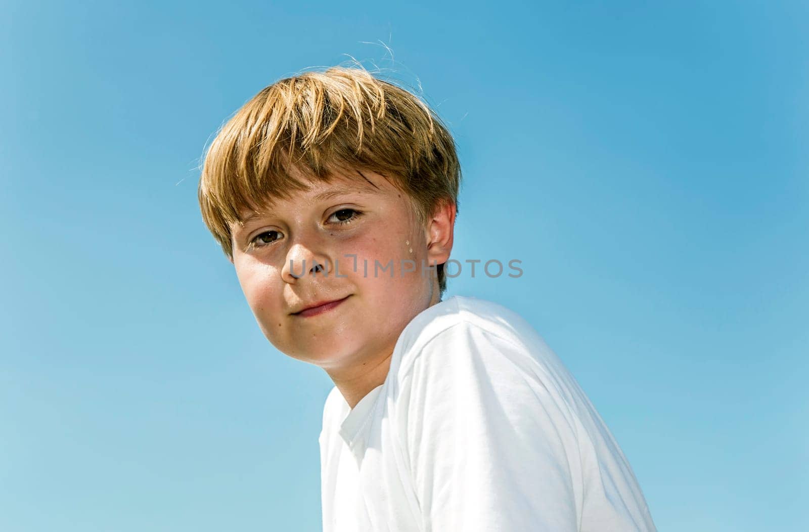 happy boy is smiling and enjoying life