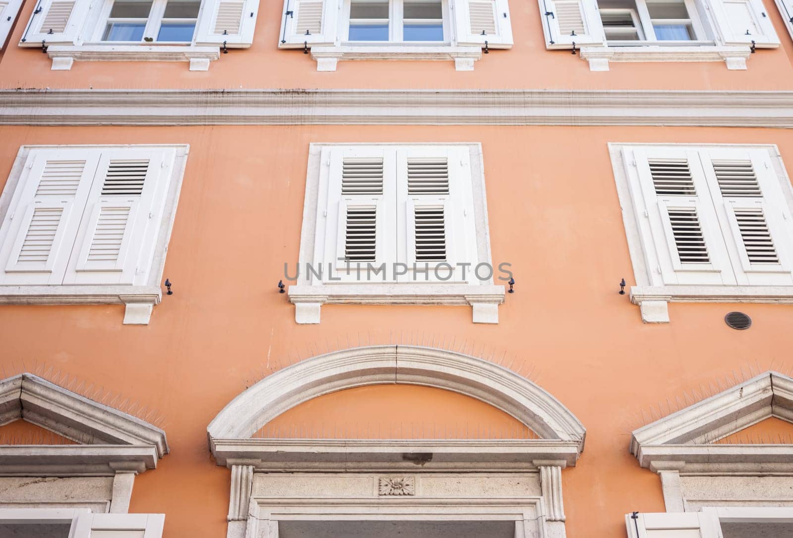 looking up at the facade of Italian building in Trieste