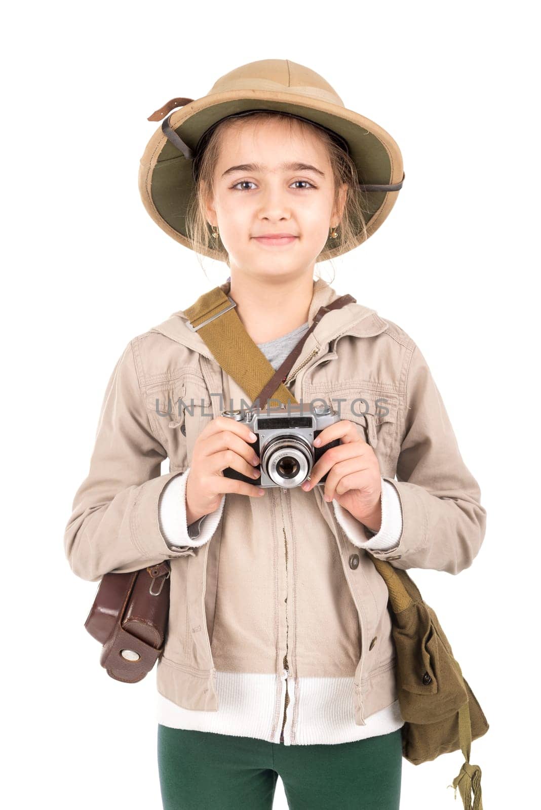 Young girl with a camera playing Safari isolated in white