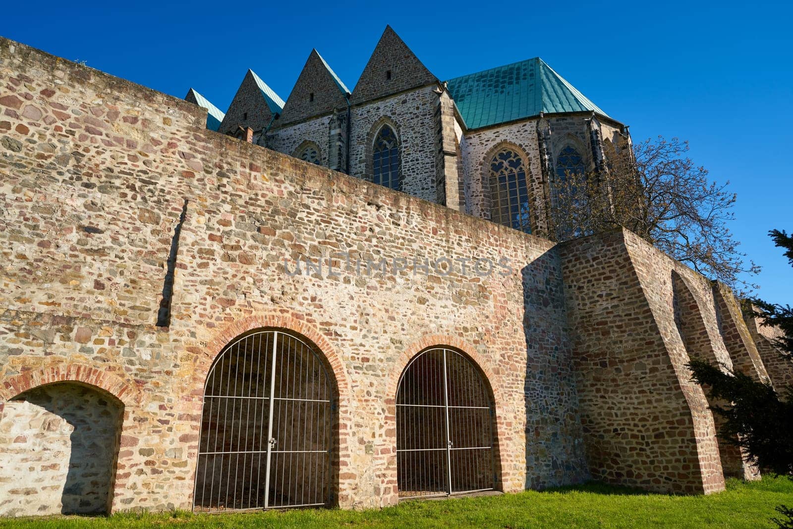 Petri Church in the old town of Magdeburg with parts of the historic city wall