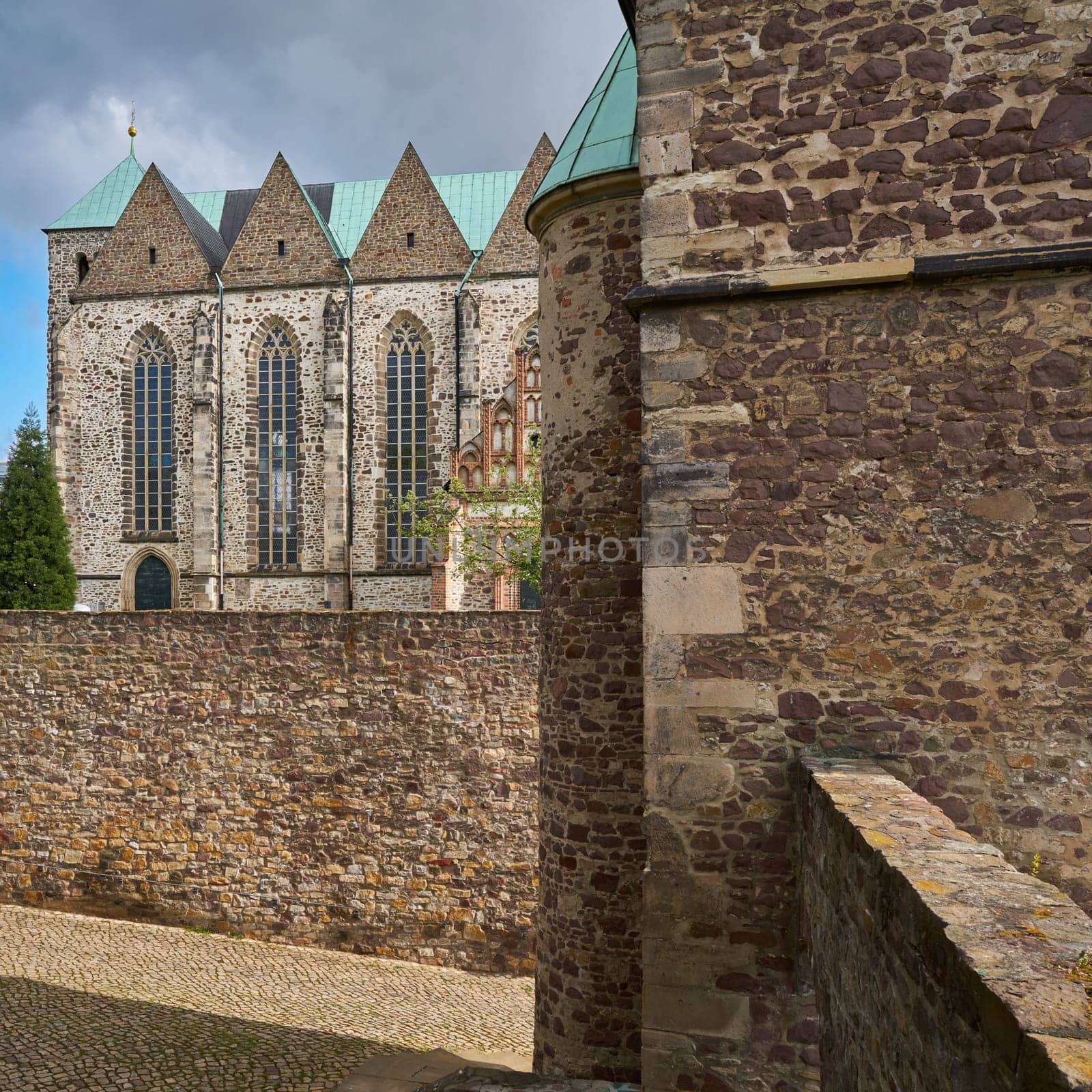Petri Church in the old town of Magdeburg with parts of the historic city wall