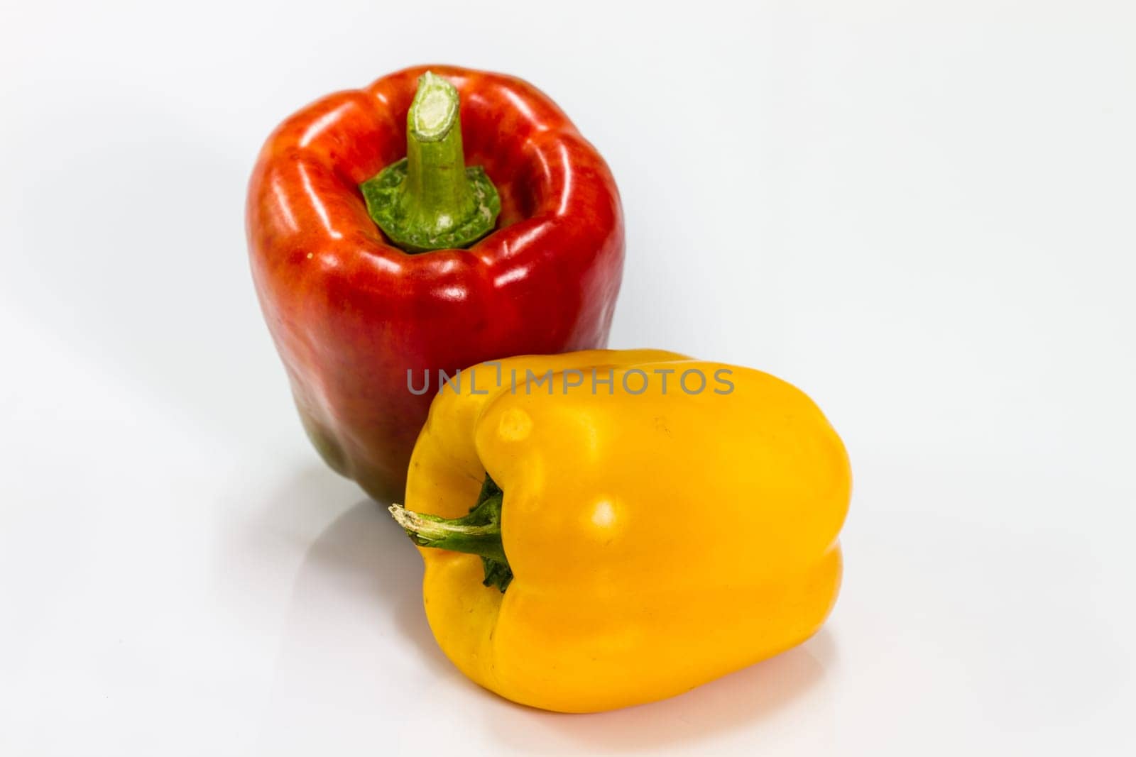 colored peppers over white background, Fresh vegetables sweet Peppers or Bell peppers