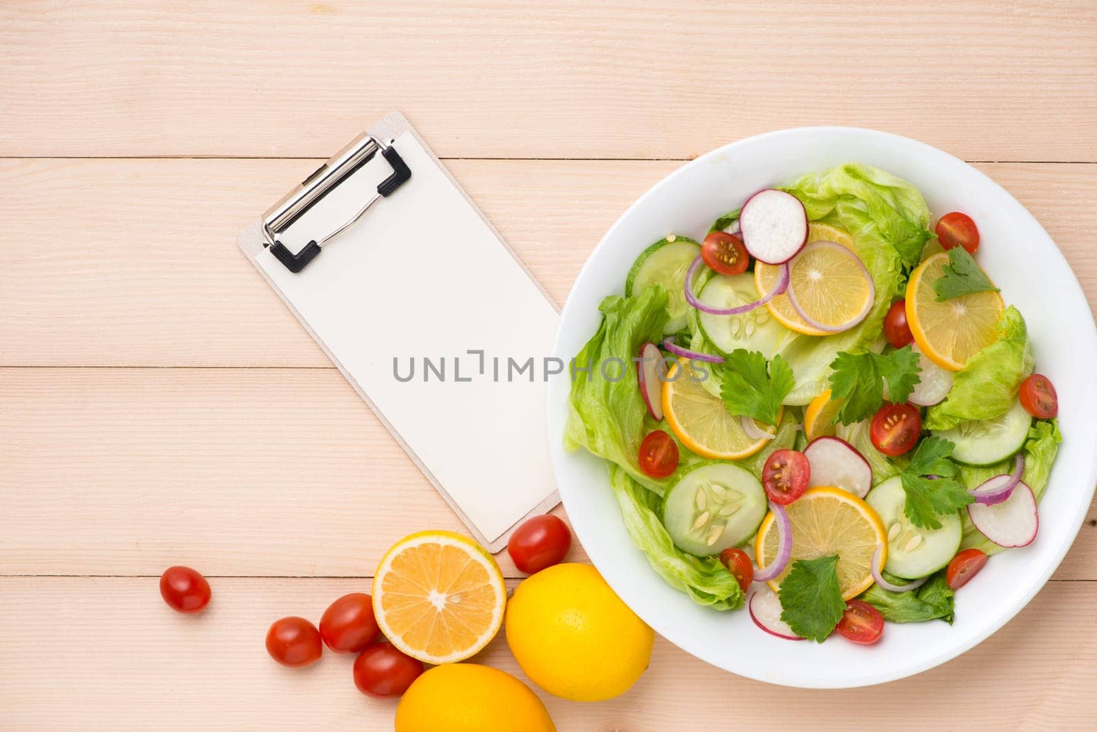 Menu, food recipe, paper and homemade fresh salad.