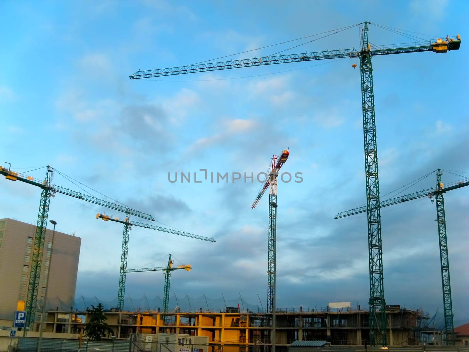 Cranes on construction site in Santander, Spain