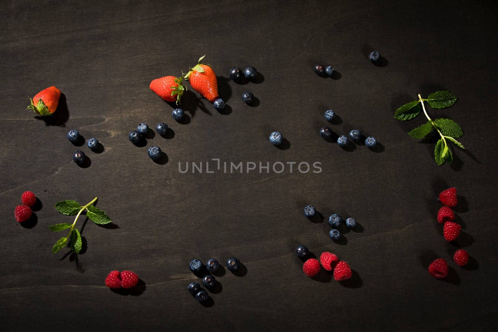 Blueberries,strawberries,raspberries and mint