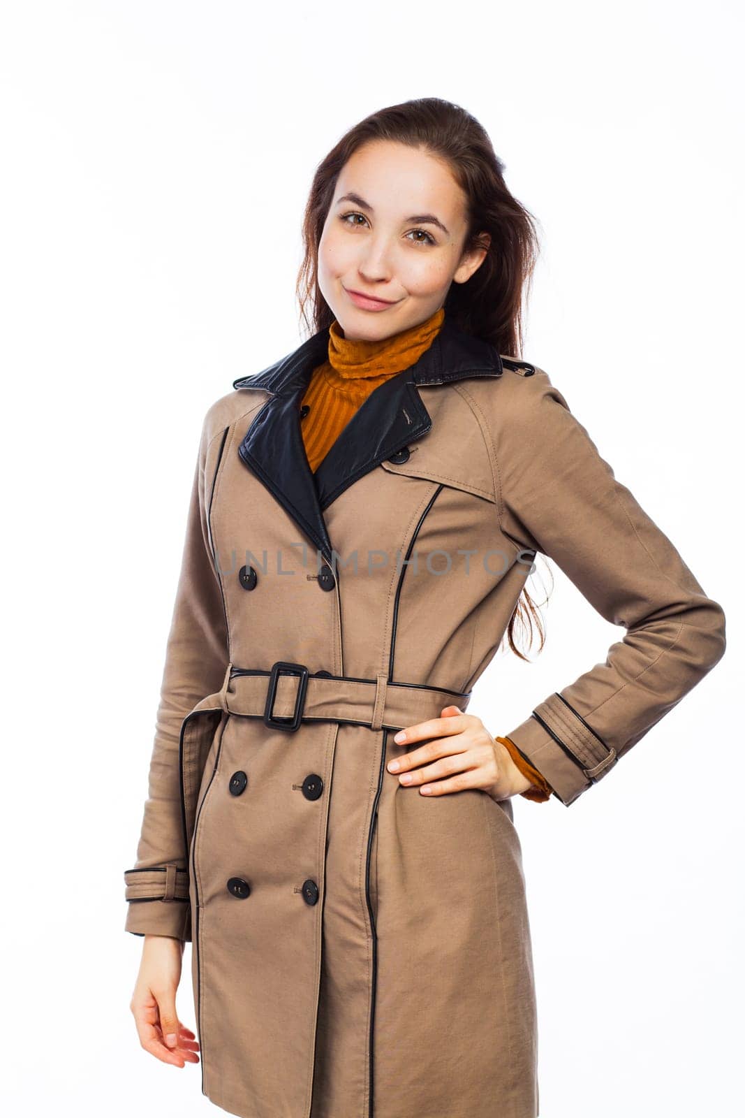 Young fashionable woman standing up, isolated on white