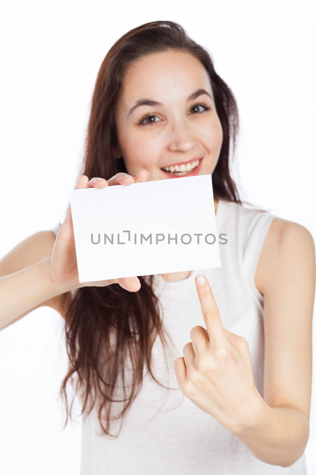 Close up view of a woman showing a blank signboard, isolated on white