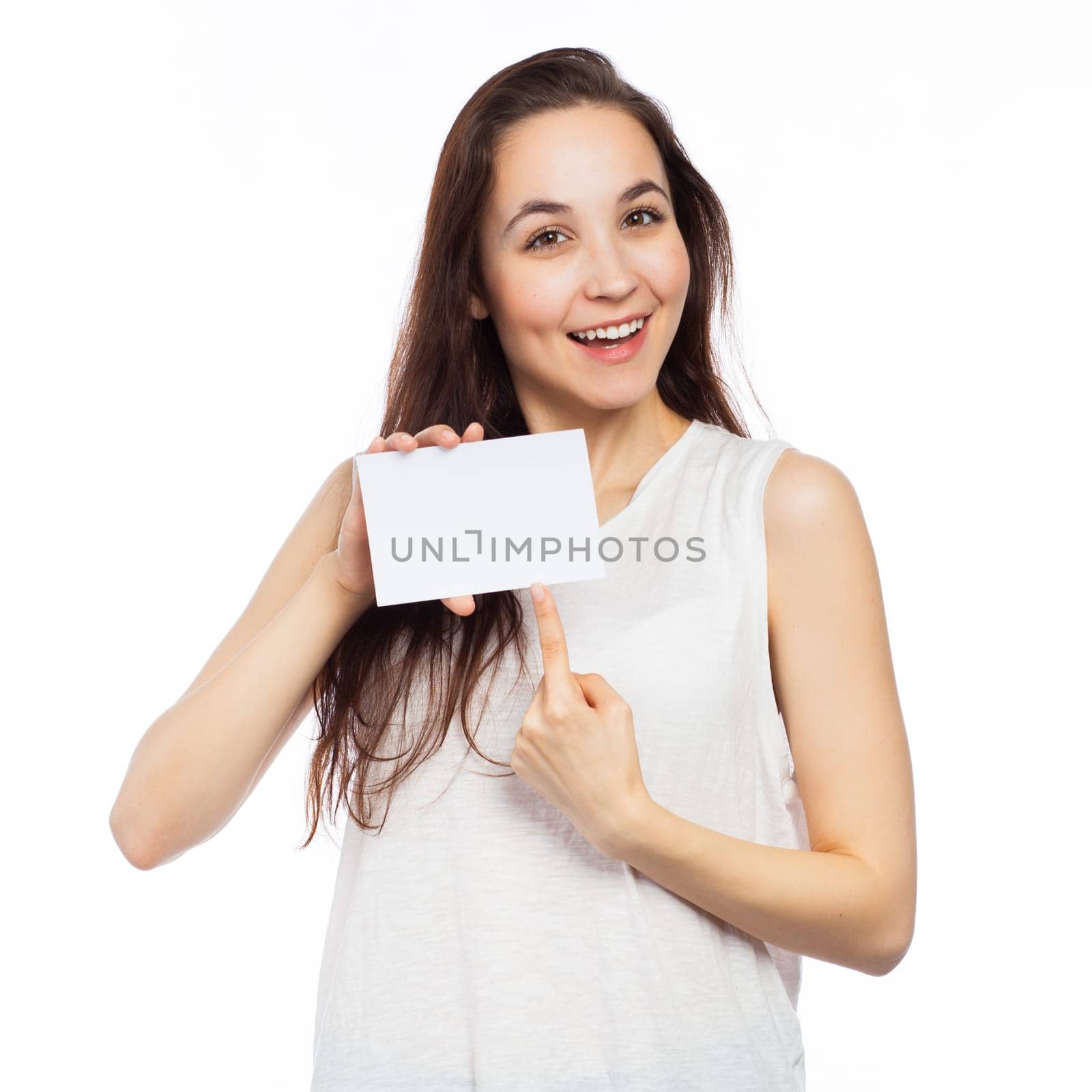 Smiling woman showing a blank signboard, isolated on white