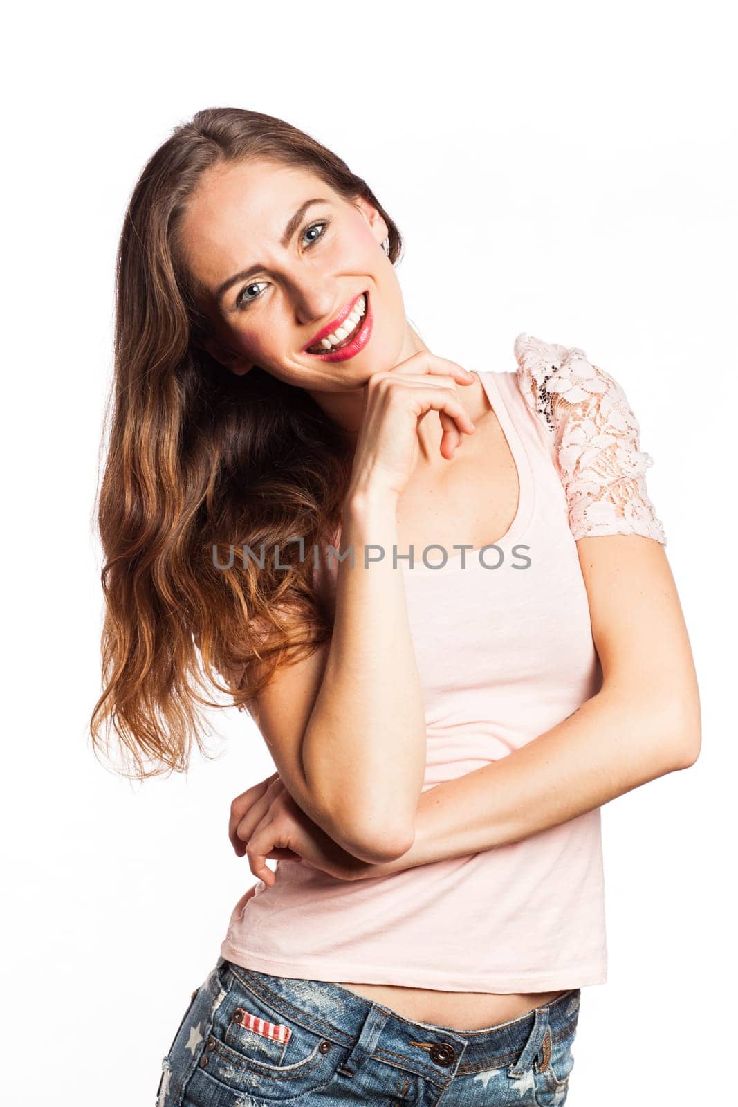 Portrait of a beautiful brunette smiling, isolated on white