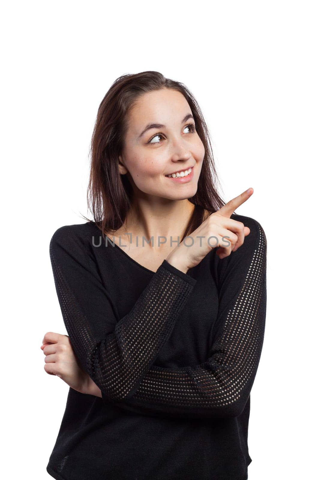 Happy woman pointing at copy space, isolated on white
