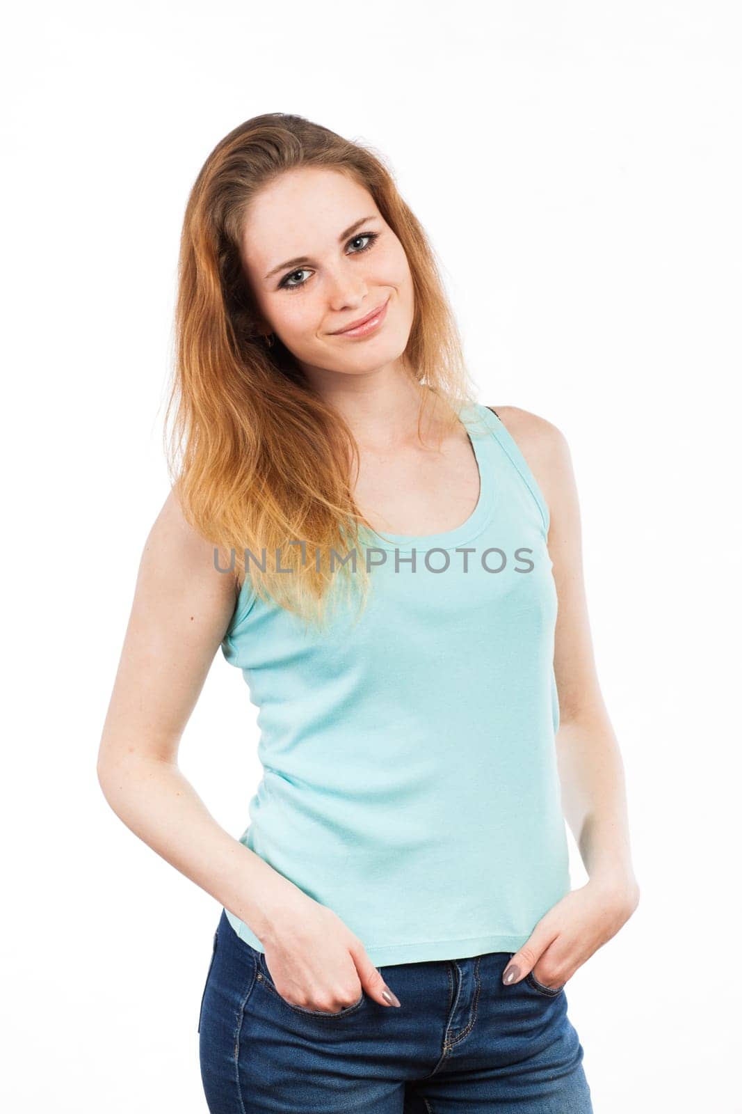 Portrait of a casual young woman standing, isolated on white