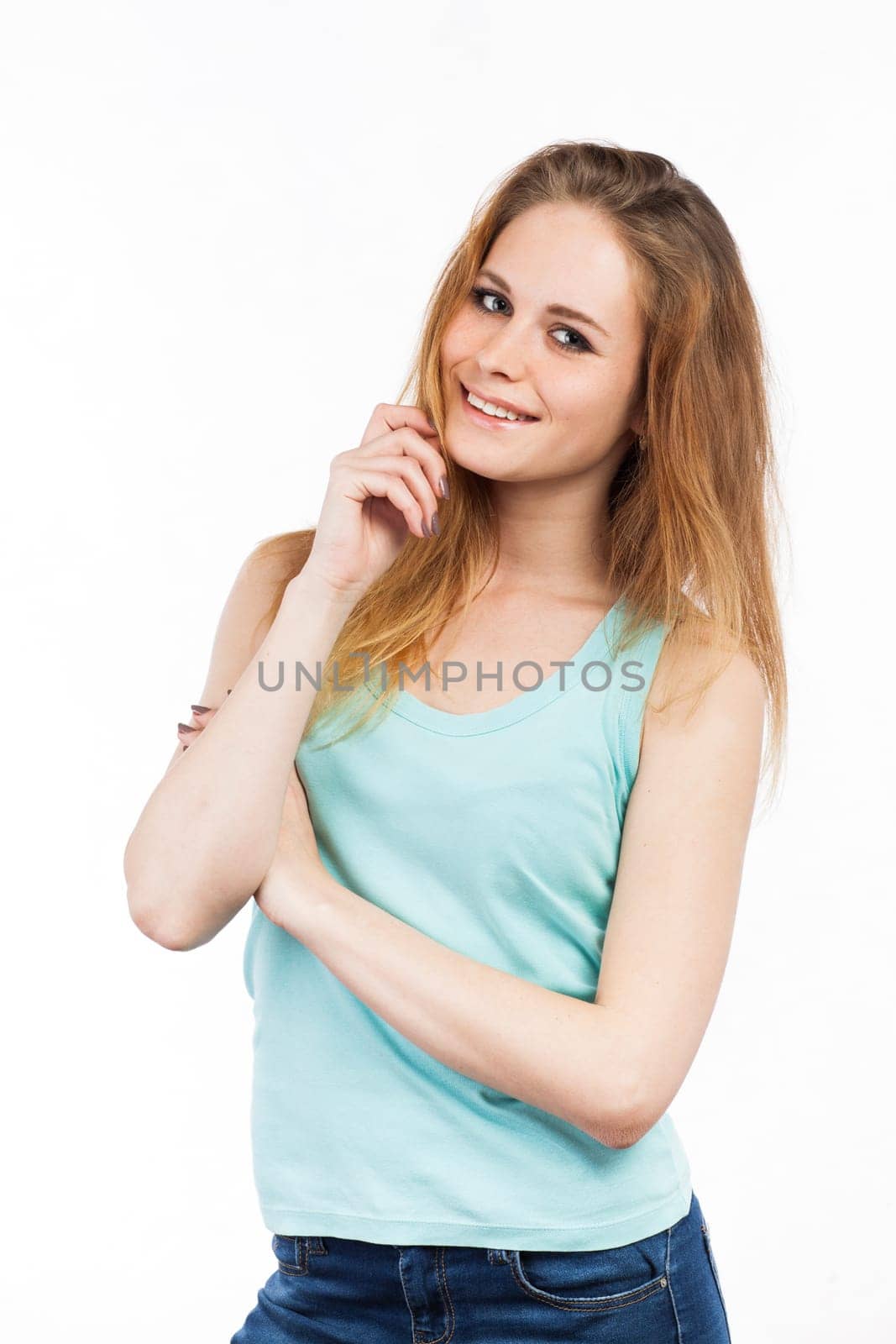 Portrait of a smiling woman standing, isolated on white