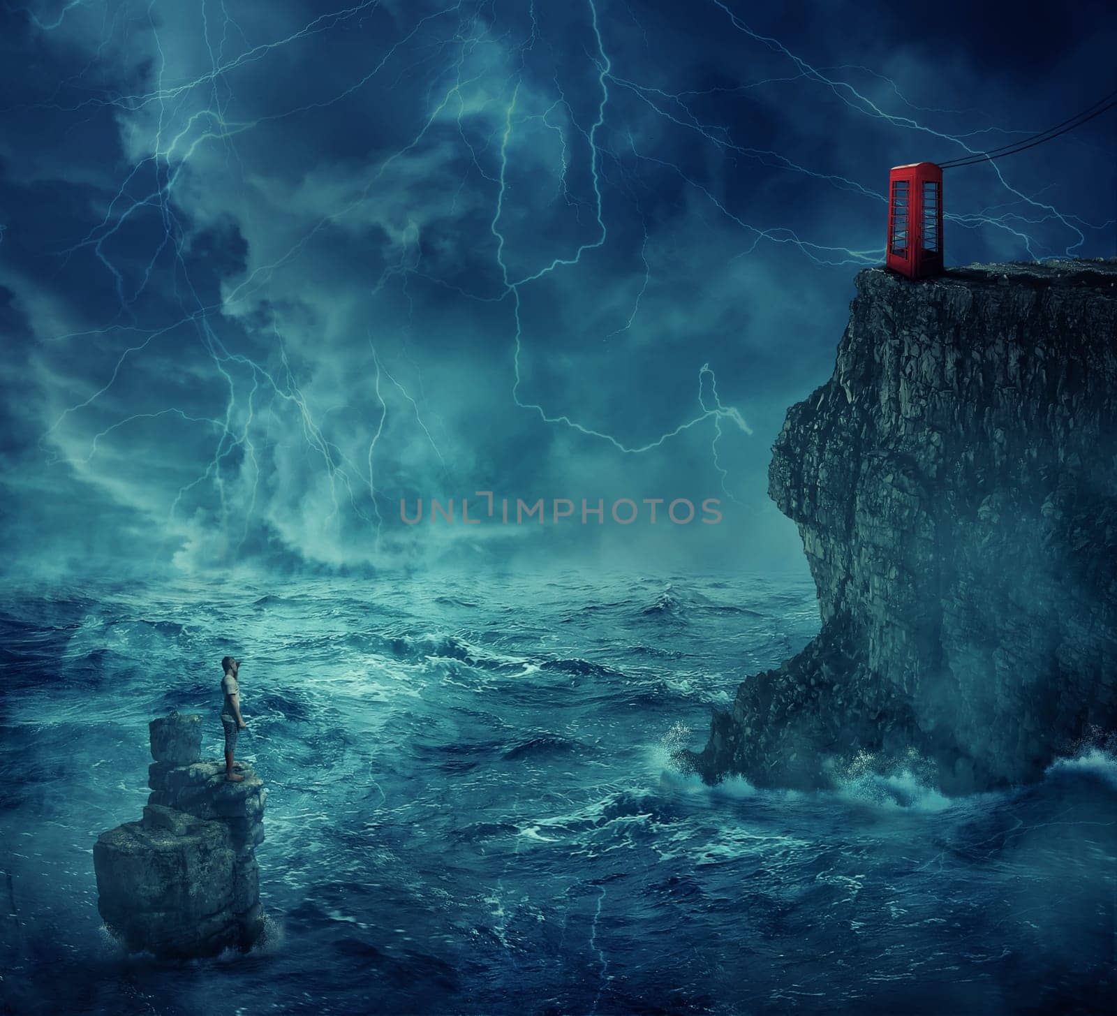 Lost man abandoned in the ocean standing on a rock island, in a stormy night with lightnings in the sky. Looking far at a cliff with a telephone box on the edge. Adventure, journey and hard determination concept.