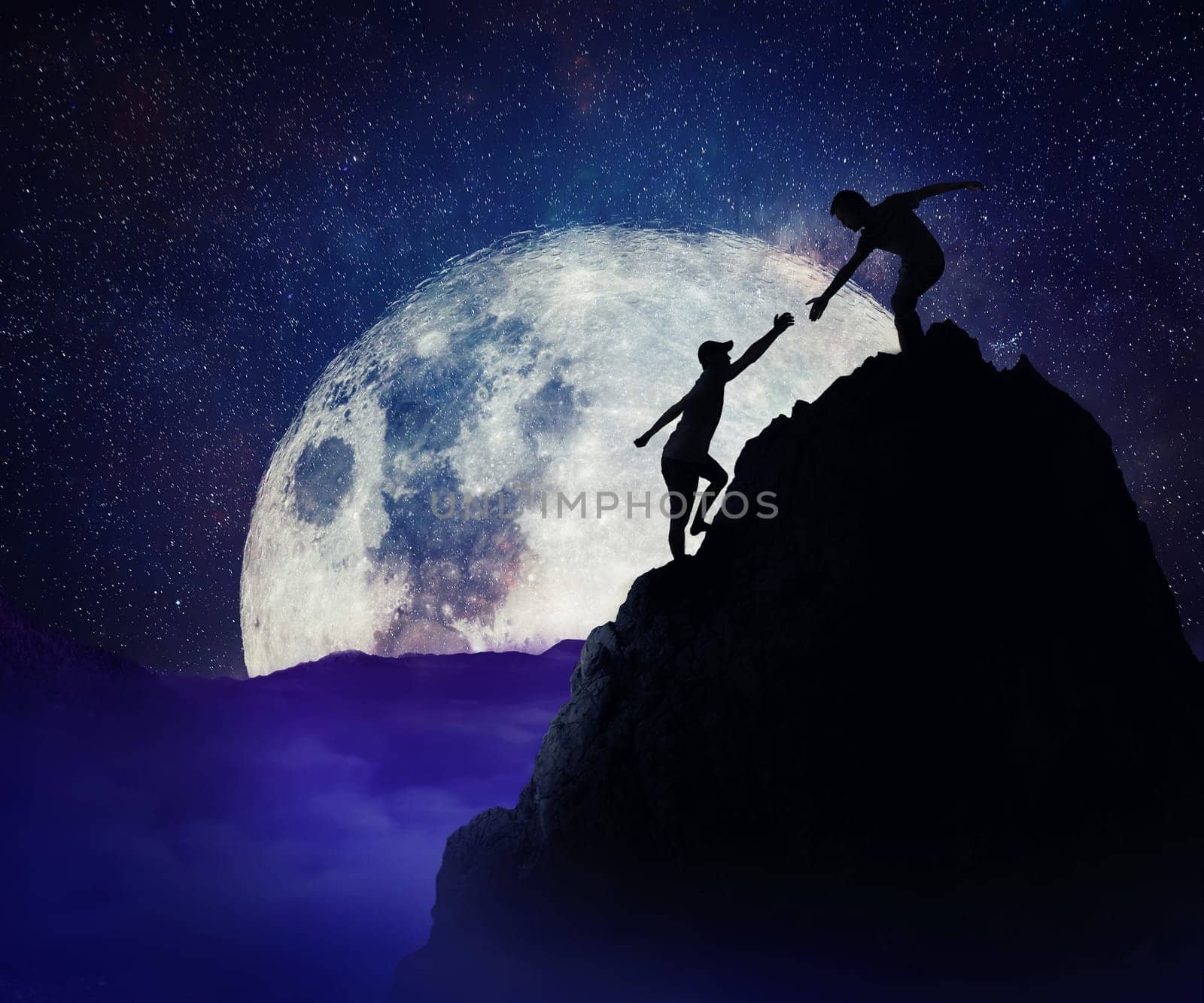 Man giving helping hand to friend to climb mountain rock cliff. Teamwork and trust concept in risky situation. Full moon night background.