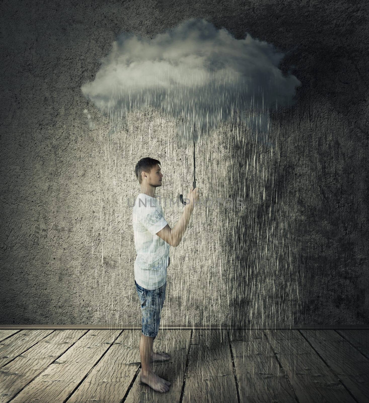 Boy stand in a room, holding a stormy, rainy cloud as umbrella. Business pessimism concept