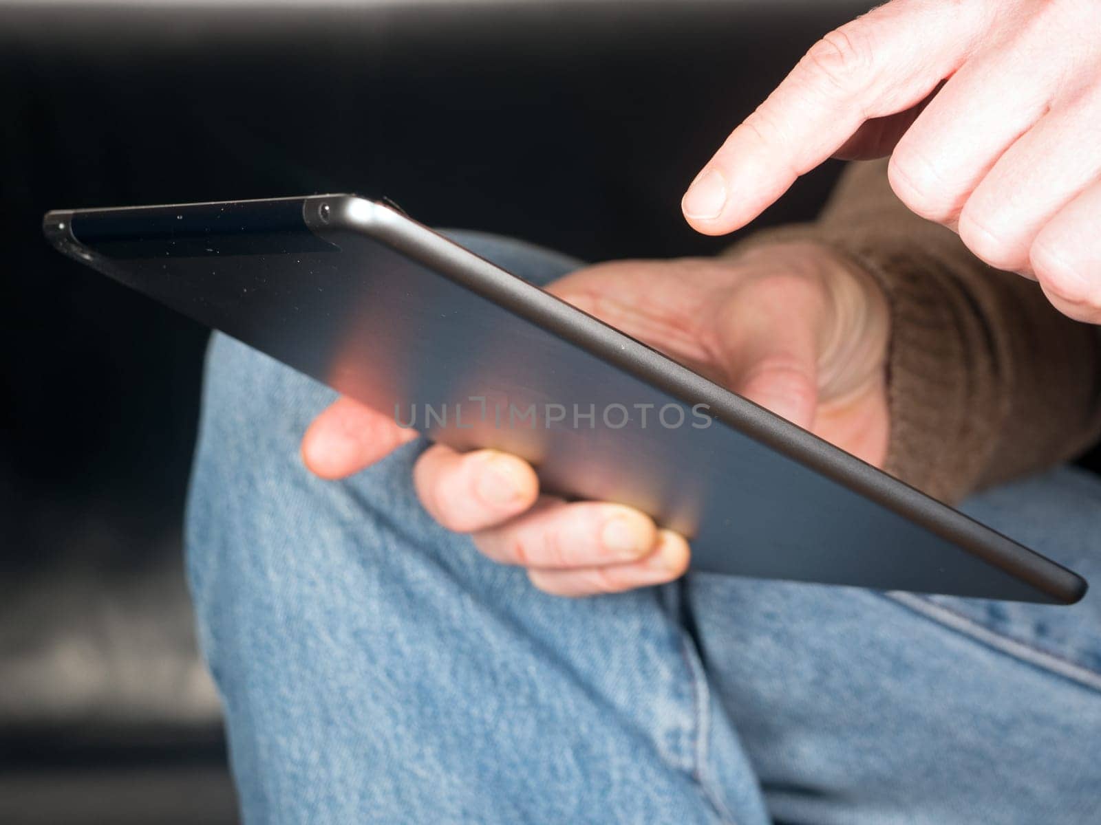 Hands Holding Tablet