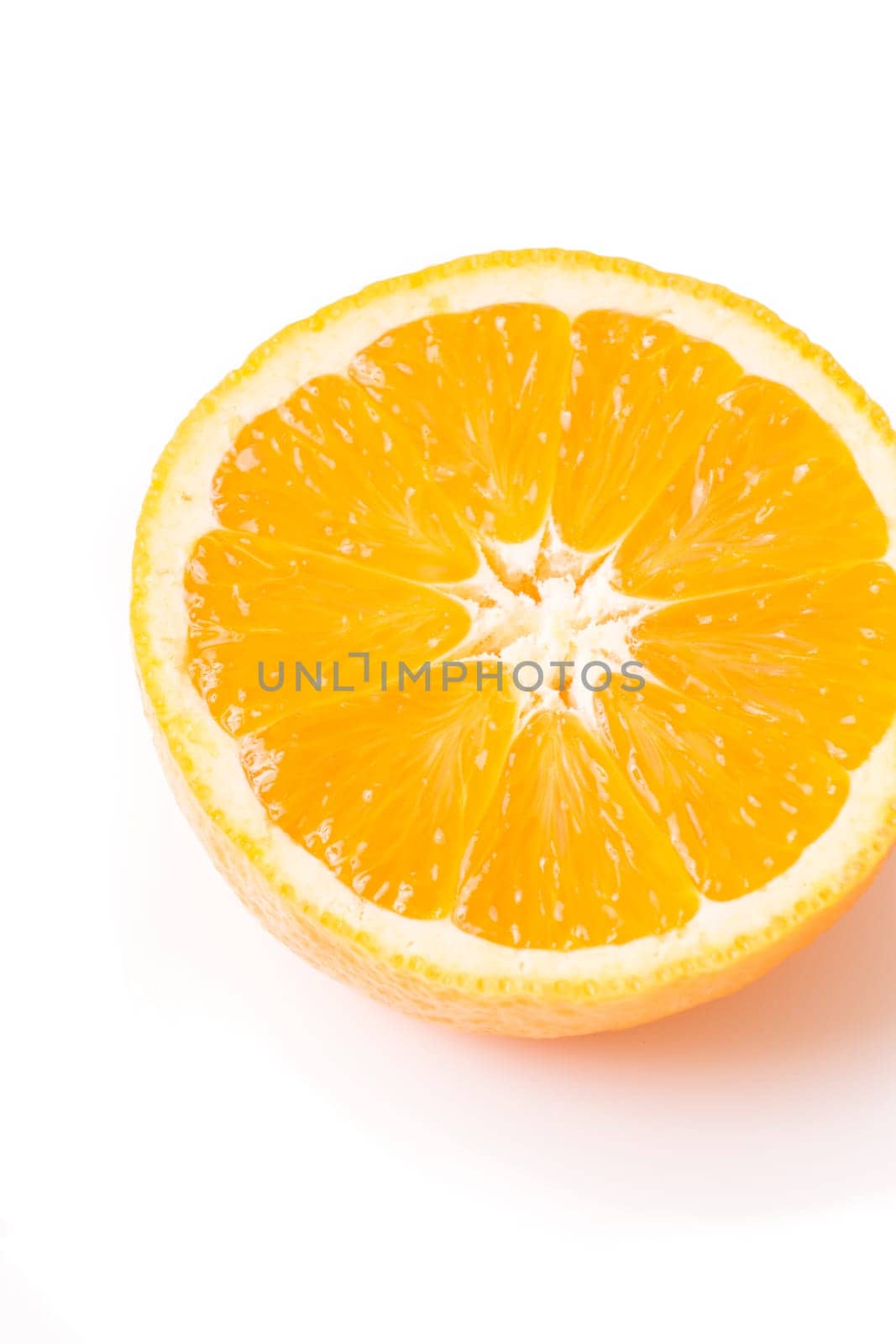 Close-up of a half lemon, isolated on white