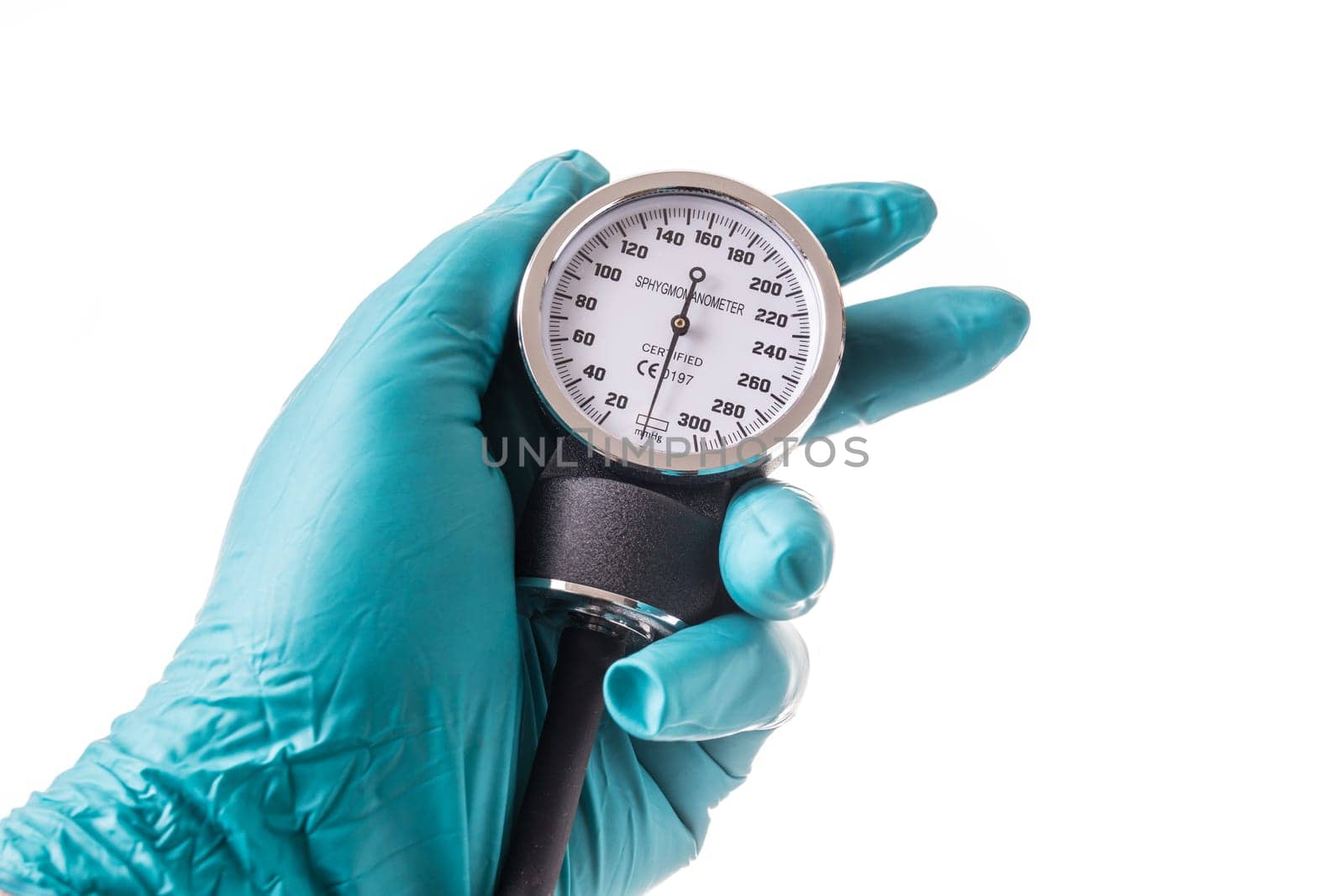 Hand with green protective glove holding an Blood pressure gauge, isolated on white background