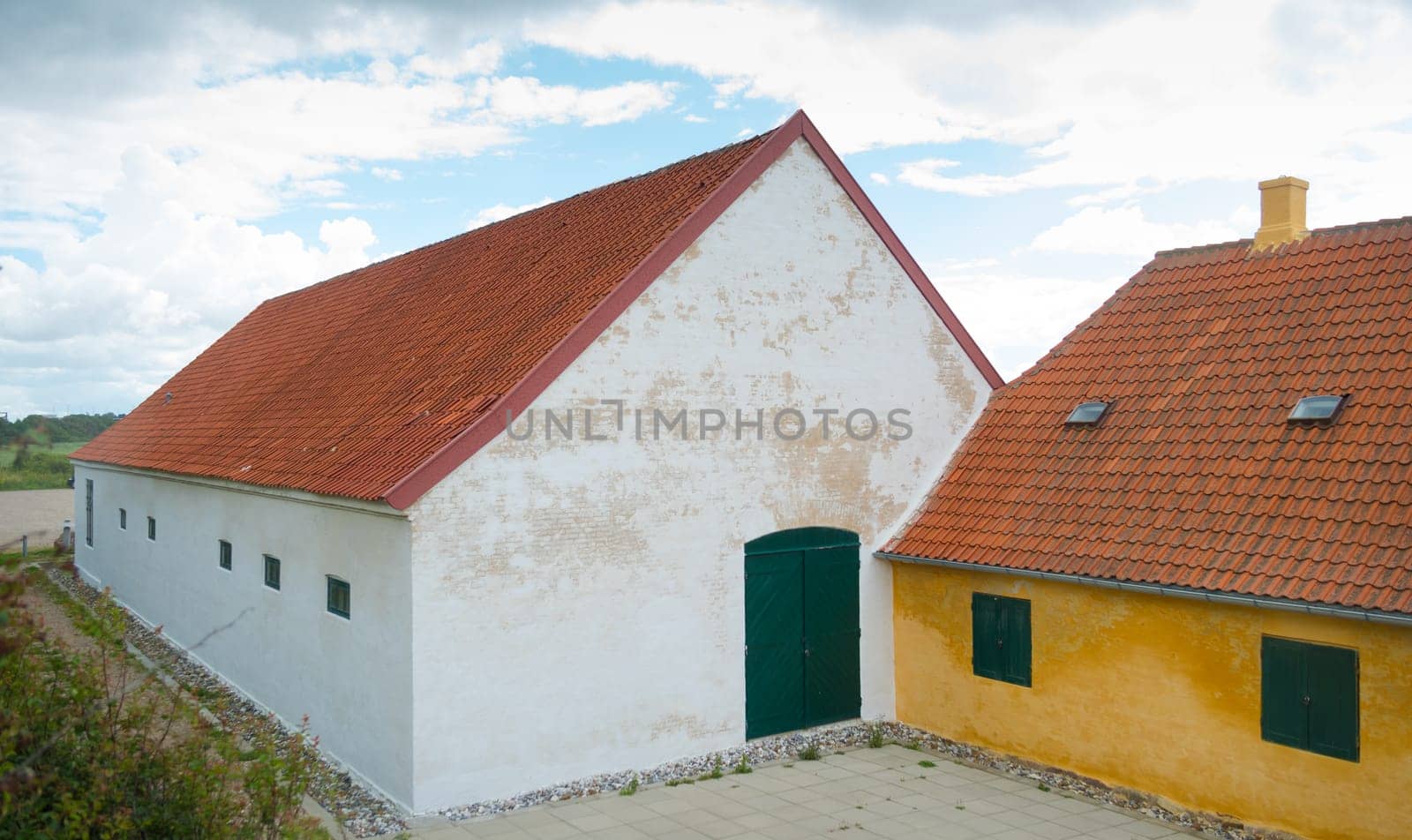danish farmhouse with barn on the Zealand island