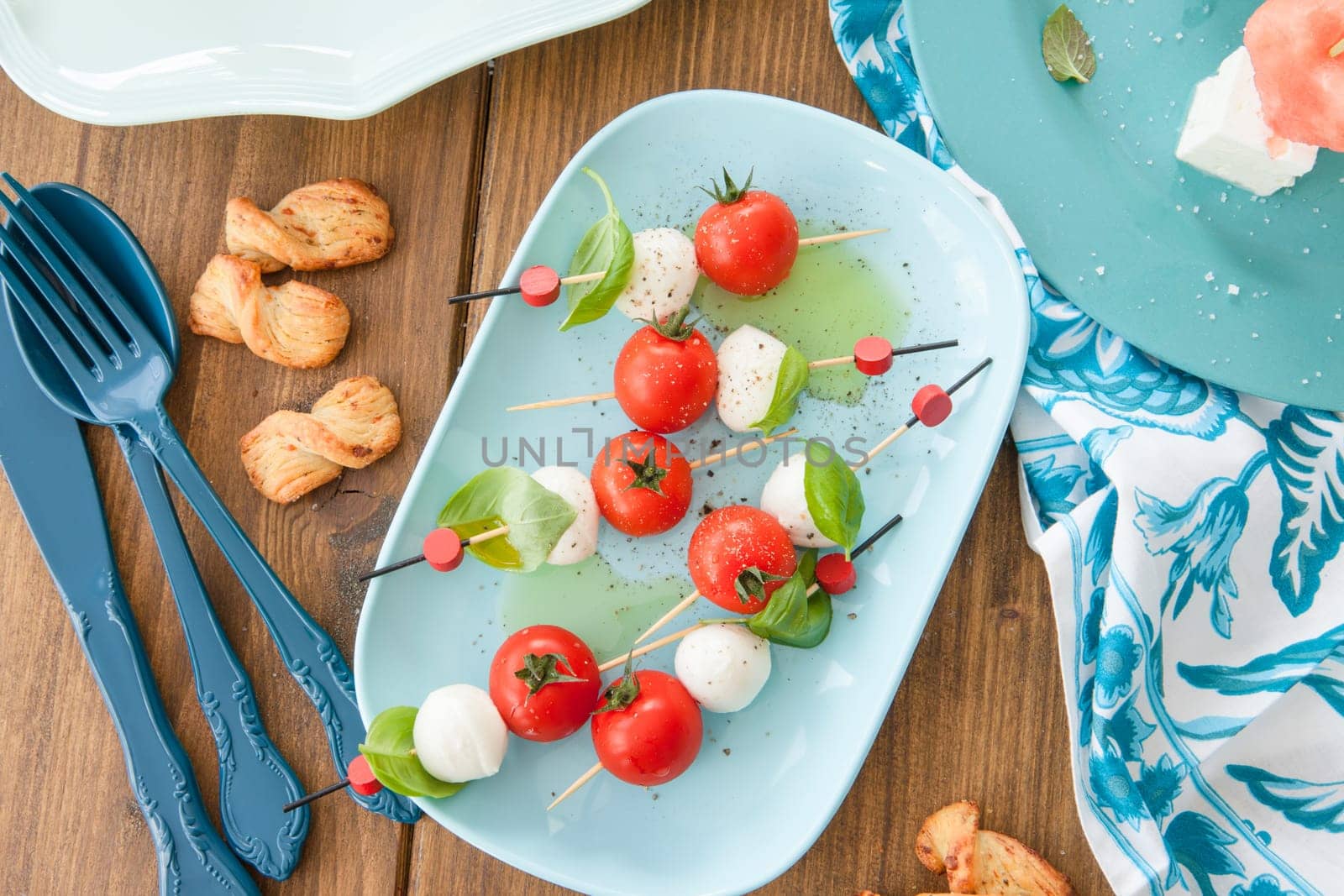 Colorful skewers with mozzarella,tomato and fresh basil