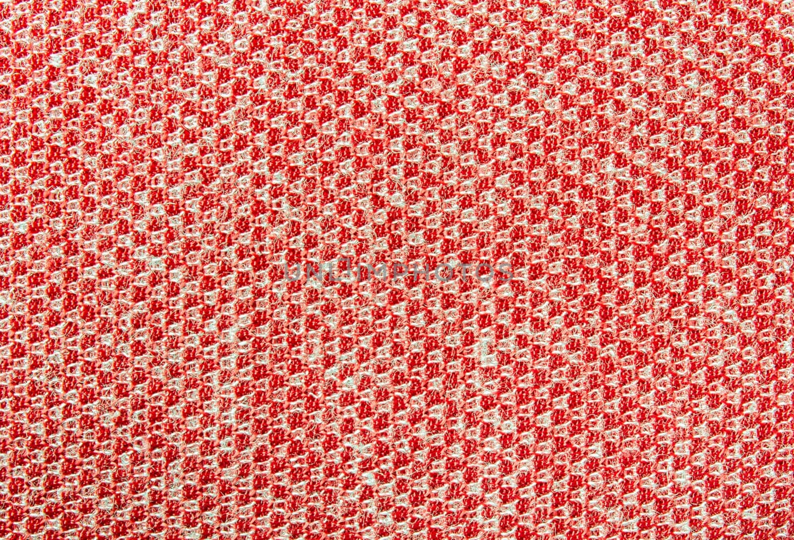 Red knitting texture background or knitted fabric pattern background for design