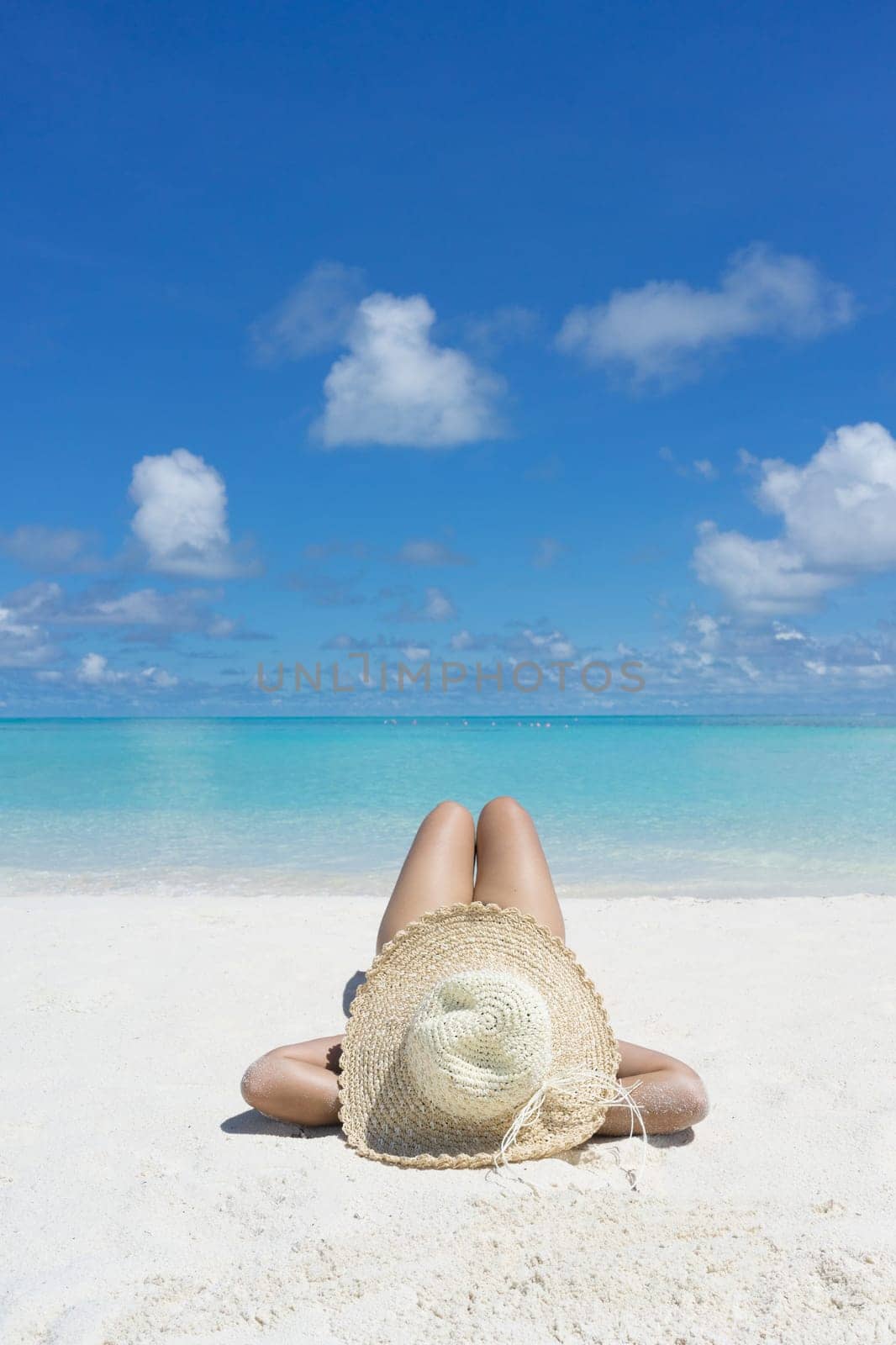 Woman in relaxation on tropical beach in holiday