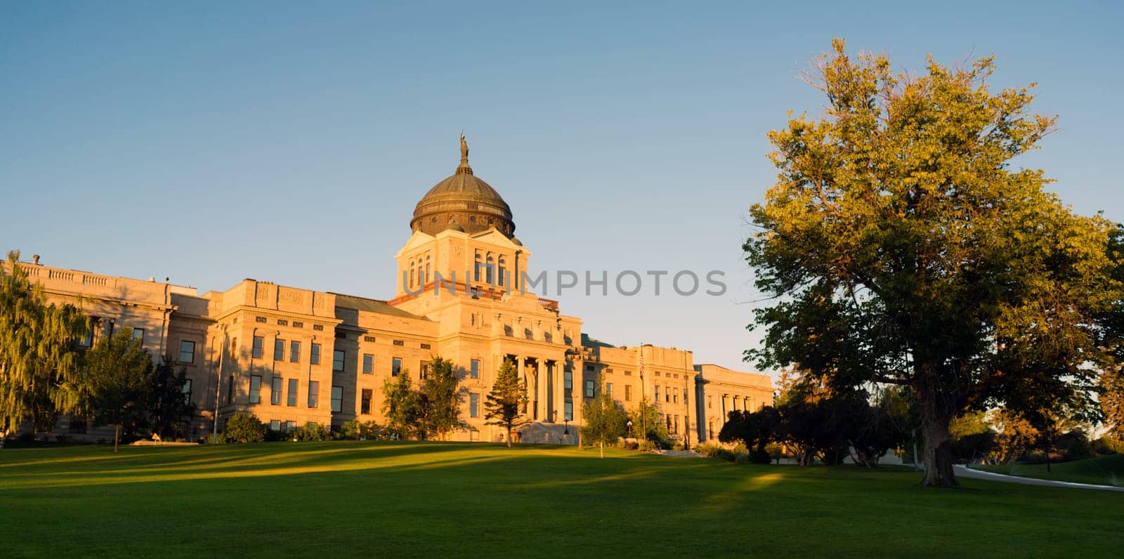 The sun hits the capital building in Helena just after sunrise
