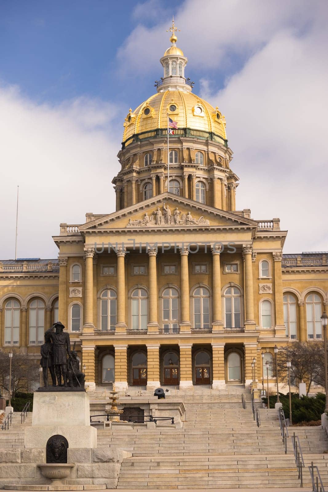 The US and State flags fly at Des Moines Capital